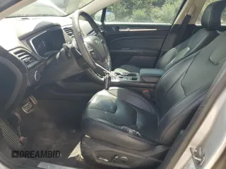 2018 Ford Fusion Titanium z VIN 3FA6P0D96JR155318, wystawiony jako Copart lot #53740505 z przebiegiem 86 567 mil mil oraz Szkoda całkowita • Salvage title. Historia ofert i sprzedaży dostępna na DreamBid. Obrazek 7.