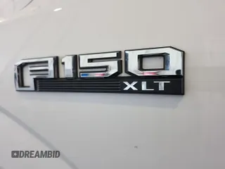 2018 Ford F-150 XL with VIN 1FTEW1EP5JKE14512, listed as a IAAI auction lot 42233450 with 152,401 mi miles and . Bid and sale history available at carsss.com. Image 17.