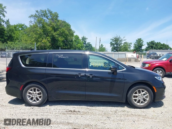 2023 Chrysler Pacifica Touring L with VIN 2C4RC1BG1PR606504, listed as a IAAI auction lot 42647652 with 41,598 mi miles and . Bid and sale history available at DreamBid. Image 14.
