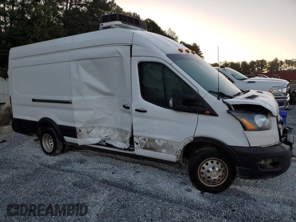 2020 Ford Transit Cargo with VIN 1FTBF4XG3LKB70573, listed as a Copart auction lot 77039474 with 131,873 mi miles and Salvage Title. Bid and sale history available at DreamBid. Image 4.