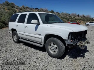 2002 Chevrolet Tahoe LS with VIN 1GNEK13T12J169198, listed as a Copart auction lot 53143445 with 152,022 mi miles and Salvage title. Bid and sale history available at DreamBid. Image 4.