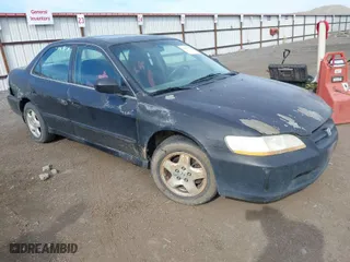 1999 Honda Accord Sdn EX with VIN 1HGCG1656XA032698, listed as a IAAI auction lot 42022130 with 287,157 mi miles. Bid and sale history available at carsss.com. Image 1.