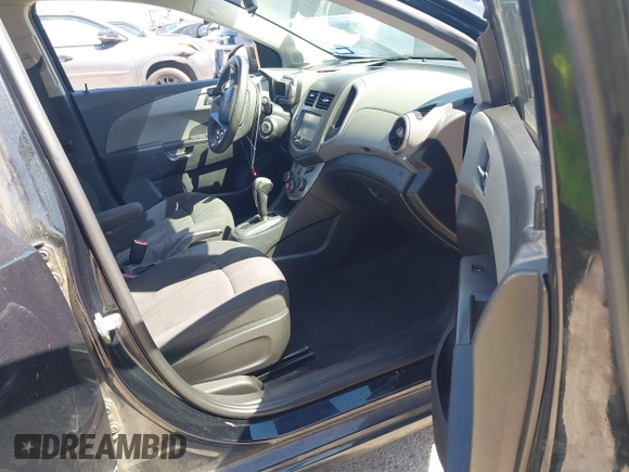 2014 Chevrolet Sonic LT with VIN 1G1JC5SH1E4243143, listed as a IAAI auction lot 41841260 with 170,514 mi miles and . Bid and sale history available at DreamBid. Image 5.