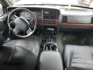 1998 Jeep Grand Cherokee with VIN 1J4FX48S1WC244308, listed as a Copart auction lot 74384714 with Not provided miles and Non repairable. Bid and sale history available at DreamBid. Image 8.