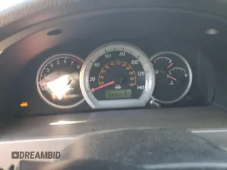 2006 Suzuki Forenza Premium z VIN KL5JJ56Z36K268290, wystawiony jako Copart lot #88509495 z przebiegiem 199 303 mil mil oraz Szkody całkowita. Historia ofert i sprzedaży dostępna na DreamBid. Obrazek 9.