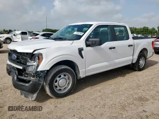 2023 Ford F-150 XL with VIN 1FTEW1CB7PKF35512, listed as a Copart auction lot 63042965 with 72,721 mi miles and Salvage title. Bid and sale history available at DreamBid. Image 1.