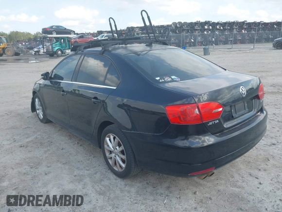 2013 Volkswagen Jetta SE with VIN 3VWDX7AJ9DM308054, listed as a IAAI auction lot 41726950 with 219,711 mi miles and . Bid and sale history available at DreamBid. Image 3.
