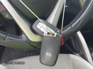 2013 Hyundai Veloster w/Black Int с VIN KMHTC6ADXDU084704, выставлен на аукционе IAAI как лот 42443297 с пробегом 111 587 миль миль и . История ставок и продаж доступна на DreamBid. Изображение 11.