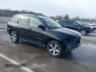 2016 Jeep Compass Latitude with VIN 1C4NJCEA5GD803959, listed as a IAAI auction lot 41443900 with 97,916 mi miles and . Bid and sale history available at DreamBid. Image 1.