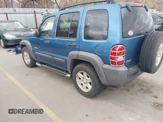 2004 Jeep Liberty Sport with VIN 1J4GK48K84W147282, listed as a IAAI auction lot 41888043 with 211,043 mi miles and . Bid and sale history available at DreamBid. Image 3.