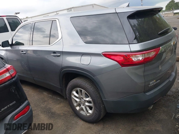 2020 Chevrolet Traverse LS with VIN 1GNERFKW5LJ245009, listed as a IAAI auction lot 42029854 with 77,771 mi miles and . Bid and sale history available at DreamBid. Image 3.