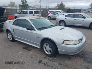 2000 Ford Mustang GT with VIN 1FAFP42X9YF173747, listed as a IAAI auction lot 41977220 with 169,097 mi miles. Bid and sale history available at carsss.com. Image 1.