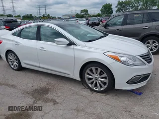2016 Hyundai Azera Limited z VIN KMHFH4JG6GA547389, wystawiony jako IAAI lot #42374403 z przebiegiem 164 843 mil mil oraz . Historia ofert i sprzedaży dostępna na DreamBid. Obrazek 1.