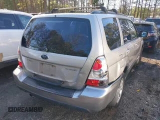 2007 Subaru Forester X w/Premium Pkg with VIN JF1SG65697H729488, listed as a IAAI auction lot 41567326 with 209,961 mi miles. Bid and sale history available at carsss.com. Image 4.