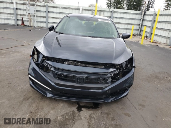 2021 Honda Civic LX z VIN 2HGFC2F69MH502002, wystawiony jako Copart lot #52882605 z przebiegiem Nie podano mil oraz Szkoda całkowita • Salvage title. Historia ofert i sprzedaży dostępna na DreamBid. Obrazek 5.