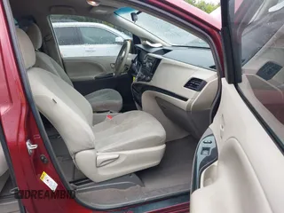 2014 Toyota Sienna L with VIN 5TDZK3DC0ES457242, listed as a IAAI auction lot 42307360 with 86,857 mi miles and . Bid and sale history available at DreamBid. Image 5.