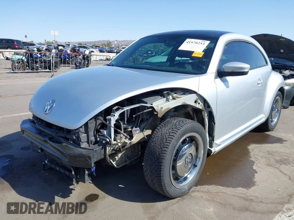 2013 Volkswagen Beetle 2.5L w/Sun/Sound/Nav with VIN 3VWJX7AT5DM606119, listed as a IAAI auction lot 41970253 with 81,004 mi miles and . Bid and sale history available at DreamBid. Image 6.