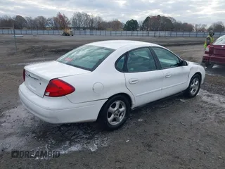 2002 Ford Taurus SES Standard with VIN 1FAFP55U12A184513, listed as a IAAI auction lot 41125306 with 241,896 mi miles. Bid and sale history available at carsss.com. Image 4.