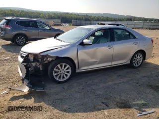 2012 Toyota Camry XLE z VIN 4T1BD1FKXCU007915, wystawiony jako Copart lot #60313605 z przebiegiem 186 574 mil mil oraz Szkoda całkowita • Salvage title. Historia ofert i sprzedaży dostępna na DreamBid. Obrazek 1.