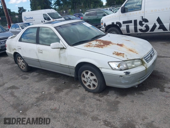 2001 Toyota Camry LE z VIN JT2BF22K310304712, wystawiony jako IAAI lot #42386743 z przebiegiem 103 552 mil mil oraz . Historia ofert i sprzedaży dostępna na DreamBid. Obrazek 1.