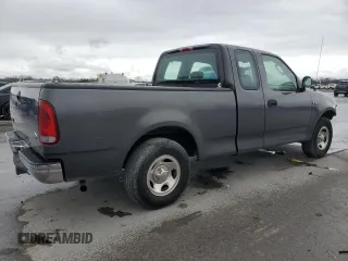 2003 Ford F-150 XL with VIN 1FTRX17273NB25441, listed as a Copart auction lot 50010445 with 100,947 mi miles and Clean Title. Bid and sale history available at carsss.com. Image 3.