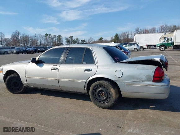 2003 Mercury Grand Marquis LS Premium with VIN 2MEFM75WX3X635171, listed as a IAAI auction lot 41789869 with 252,679 mi miles. Bid and sale history available at carsss.com. Image 15.