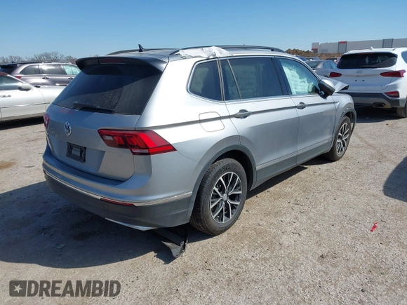 2021 Volkswagen Tiguan SE with VIN 3VV3B7AXXMM116774, listed as a IAAI auction lot 41868796 with Not Provided miles and . Bid and sale history available at DreamBid. Image 4.