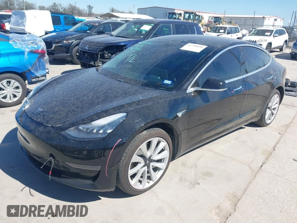 2020 Tesla Model 3 Standard Range Plus with VIN 5YJ3E1EAXLF614002, listed as a IAAI auction lot 41758898 with 42,363 mi miles and . Bid and sale history available at DreamBid. Image 22.