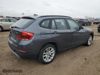 2015 BMW X1 xDrive28i with VIN WBAVL1C52FVY26870, listed as a Copart auction lot 43710555 with 0 mi miles and Salvage Title. Bid and sale history available at carsss.com. Image 3.