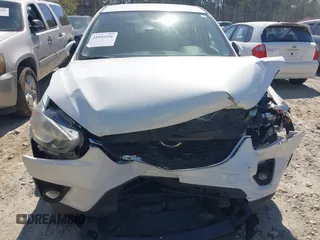 2013 Mazda CX-5 Touring with VIN JM3KE2CE0D0119032, listed as a IAAI auction lot 41891556 with 174,745 mi miles and . Bid and sale history available at carsss.com. Image 6.
