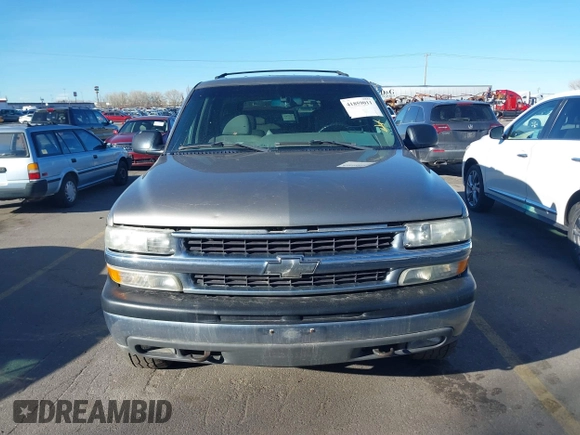 2002 Chevrolet Tahoe Z71 with VIN 1GNEK13Z32R125421, listed as a IAAI auction lot 41859011 with 216,021 mi miles. Bid and sale history available at carsss.com. Image 6.
