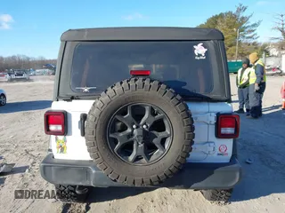 2021 Jeep Wrangler Unlimited Sport S with VIN 1C4HJXDG5MW697149, listed as a IAAI auction lot 41642386 with 71,253 mi miles. Bid and sale history available at carsss.com. Image 16.