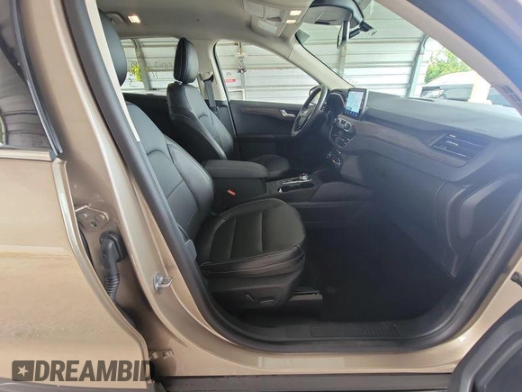 2020 Ford Escape Titanium Hybrid with VIN 1FMCU0DZ5LUB81972, listed as a IAAI auction lot 42679188 with 19,400 mi miles and . Bid and sale history available at DreamBid. Image 6.
