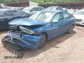 2021 Volkswagen Jetta S z VIN 3VWC57BU6MM033172, wystawiony jako IAAI lot #42371654 z przebiegiem 38 488 mil mil oraz . Historia ofert i sprzedaży dostępna na DreamBid. Obrazek 17.