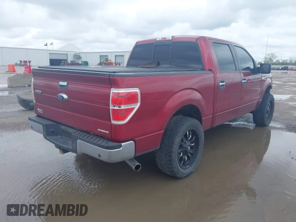 2014 Ford F-150 XL with VIN 1FTFW1CF2EKF21358, listed as a IAAI auction lot 41898227 with 76,572 mi miles. Bid and sale history available at carsss.com. Image 4.