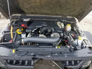 2020 Jeep Gladiator Sport S z VIN 1C6HJTAG0LL168969, wystawiony jako Copart lot #59283365 z przebiegiem 67 810 mil mil oraz Szkoda całkowita • Salvage title. Historia ofert i sprzedaży dostępna na DreamBid. Obrazek 11.