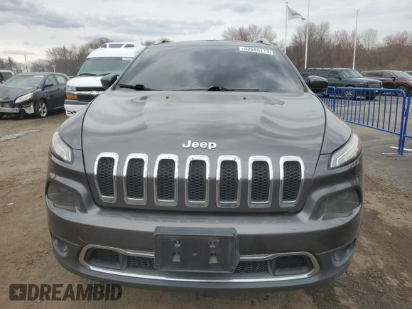 2014 Jeep Cherokee Limited with VIN 1C4PJMDB7EW138895, listed as a Copart auction lot 52585115 with 199,744 mi miles and Salvage Title. Bid and sale history available at DreamBid. Image 5.