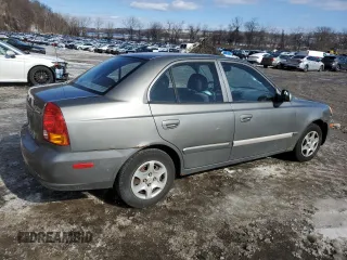 2003 Hyundai Accent GL with VIN KMHCG45C33U469496, listed as a Copart auction lot 45926595 with 77,737 mi miles and Salvage Title. Bid and sale history available at carsss.com. Image 3.
