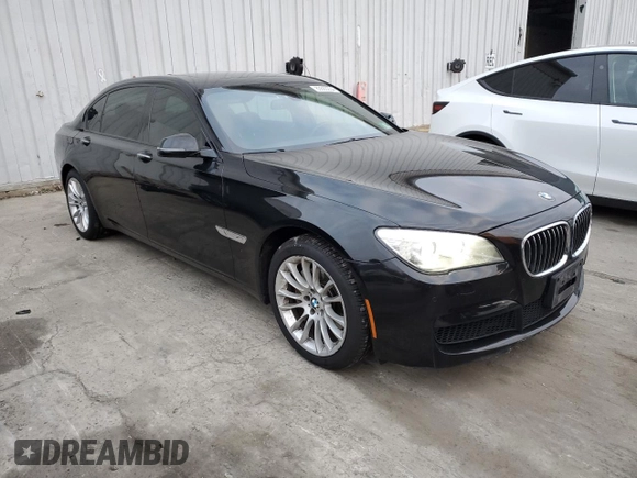 2014 BMW 7 Series 740Li xDrive with VIN WBAYF4C59ED281776, listed as a Copart auction lot 83563234 with 77,899 mi miles and Salvage Title. Bid and sale history available at carsss.com. Image 4.