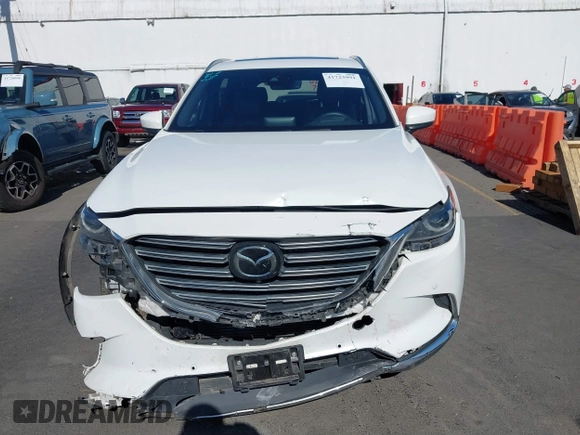 2020 Mazda CX-9 Signature with VIN JM3TCBEY3L0418322, listed as a IAAI auction lot 41723991 with 57,325 mi miles and . Bid and sale history available at carsss.com. Image 12.