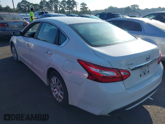 2016 Nissan Altima S with VIN 1N4AL3AP9GN355504, listed as a IAAI auction lot 42631887 with 122,957 mi miles and . Bid and sale history available at DreamBid. Image 3.