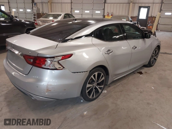 2018 Nissan Maxima SV with VIN 1N4AA6APXJC367526, listed as a IAAI auction lot 41427841 with 113,533 mi miles and . Bid and sale history available at DreamBid. Image 4.
