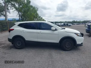 2019 Nissan Rogue S with VIN JN1BJ1CP2KW238844, listed as a IAAI auction lot 41997484 with 105,464 mi miles and . Bid and sale history available at DreamBid. Image 14.