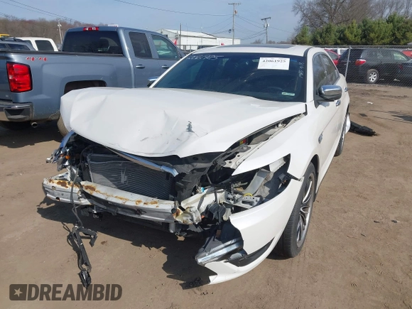 2015 Ford Taurus SEL z VIN 1FAHP2E86FG202386, wystawiony jako IAAI lot #42061925 z przebiegiem 123 475 mil mil oraz . Historia ofert i sprzedaży dostępna na DreamBid. Obrazek 2.