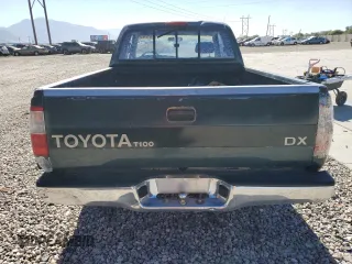 1995 Toyota T100 DX z VIN JT4VD12E0S0005758, wystawiony jako Copart lot #74018364 z przebiegiem 394 656 mil mil oraz Szkody całkowita. Historia ofert i sprzedaży dostępna na DreamBid. Obrazek 6.