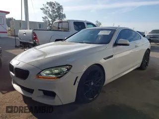 2012 BMW 6 Series 650i with VIN WBALX3C52CC528401, listed as a IAAI auction lot 42046910 with 105,844 mi miles. Bid and sale history available at carsss.com. Image 2.