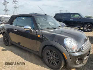2011 MINI Convertible with VIN WMWZN3C57BT133547, listed as a Copart auction lot 64819375 with Not provided miles and Clean title. Bid and sale history available at DreamBid. Image 4.
