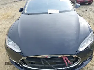 2014 Tesla Model S 60 with VIN 5YJSA1S12EFP42605, listed as a IAAI auction lot 40905031 with 68,155 mi miles and . Bid and sale history available at DreamBid. Image 10.