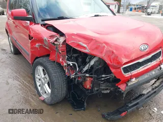 2010 Kia Soul + with VIN KNDJT2A27A7160893, listed as a IAAI auction lot 41312041 with 221,568 mi miles. Bid and sale history available at carsss.com. Image 6.