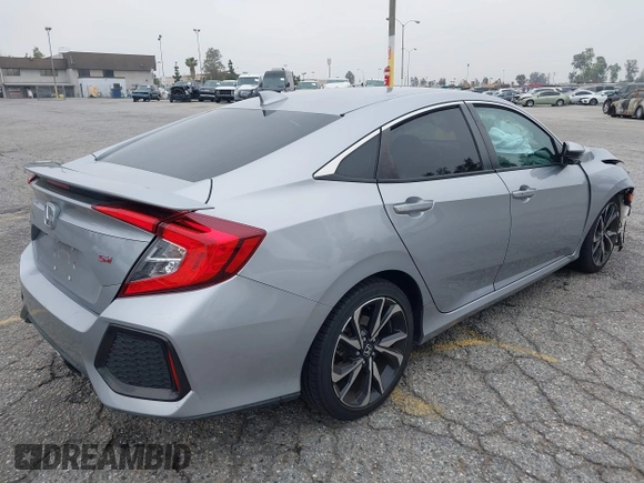 2018 Honda Civic Si with VIN 2HGFC1E50JH708274, listed as a IAAI auction lot 42034872 with 48,551 mi miles and . Bid and sale history available at DreamBid. Image 4.